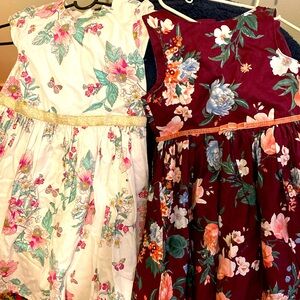2 beautiful dresses look like new in good condition